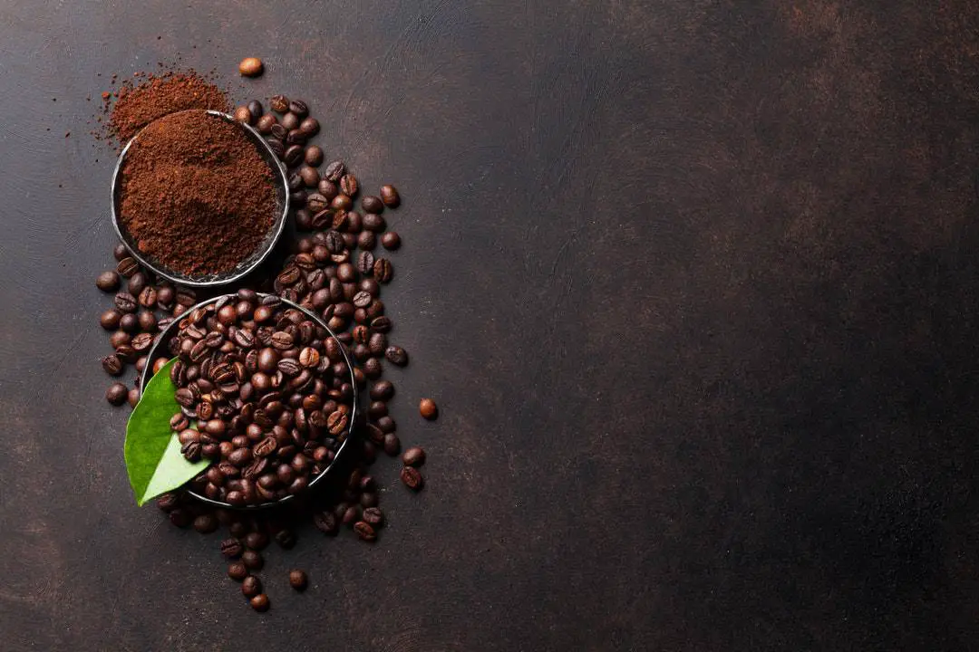 coffee beans ground in a cup