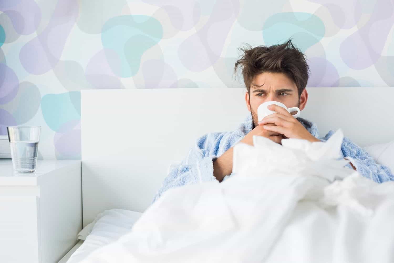 man drinking coffee when sick.