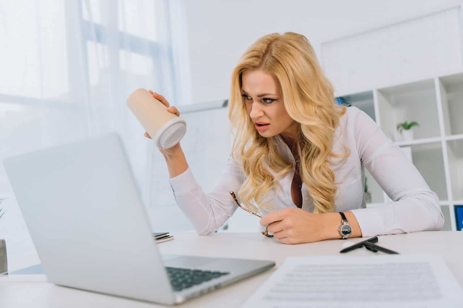 woman getting angry after drinking coffee.