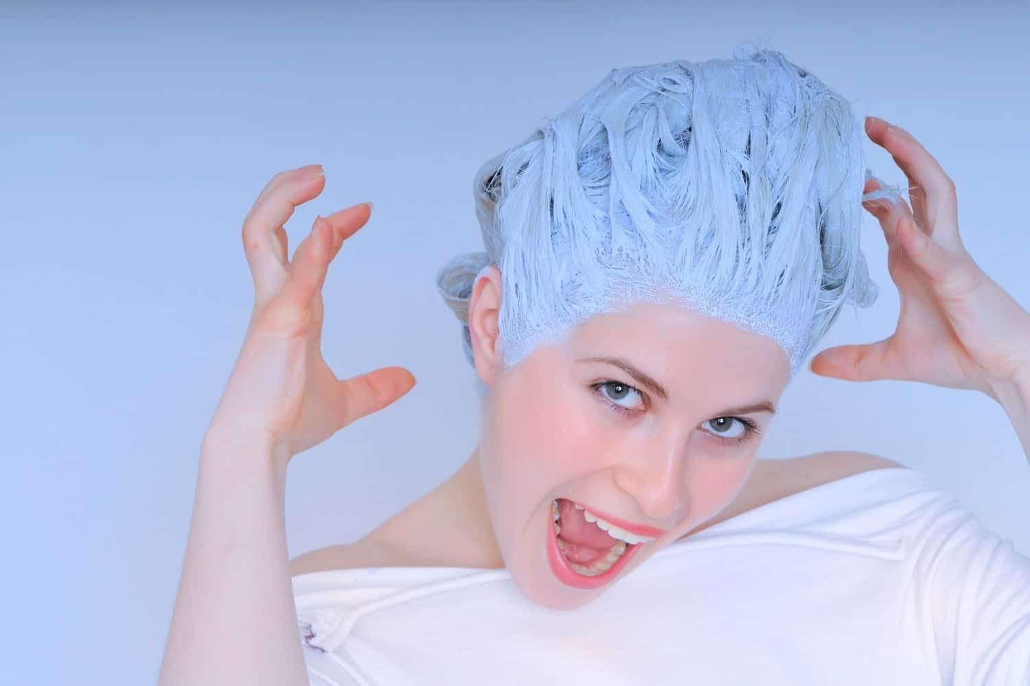 young woman with coffee hair dye on her hair.