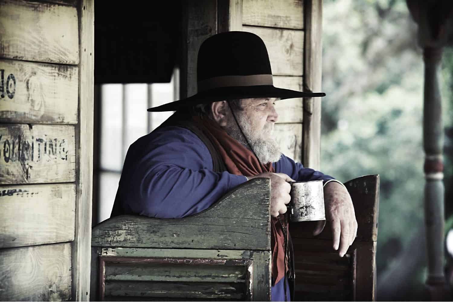man drinking freshly brewed cowboy coffee.