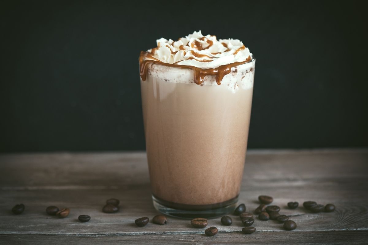 cold frappe coffee with whipped cream and caramel