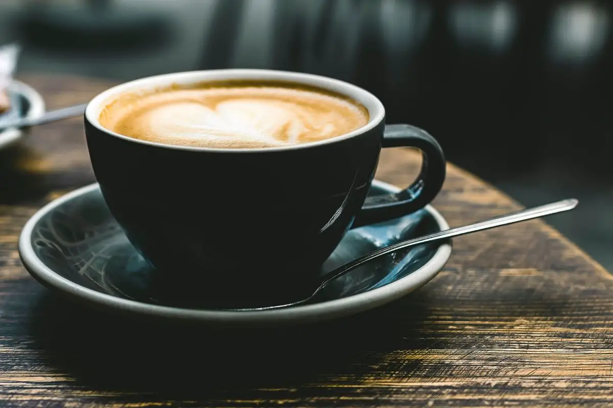 cup of cappuccino with a foam art