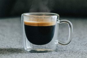 espresso poured in a cup that was prepared the day before