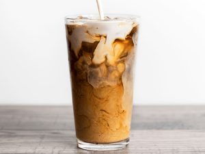 ice latte and ice added in the coffee