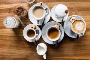 white coffee cups on the wooden table