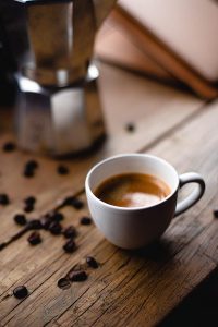 white coffee mug on the wooden table