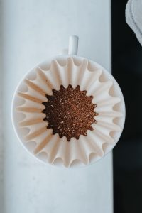 white muffin tray on top of white ceramic mug 1