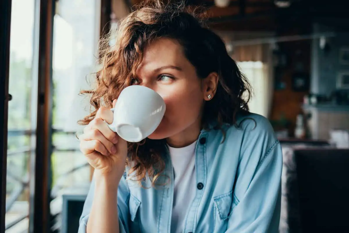 woman having her daily dose of coffee
