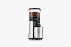 coffee grinder filled with coffee beans
