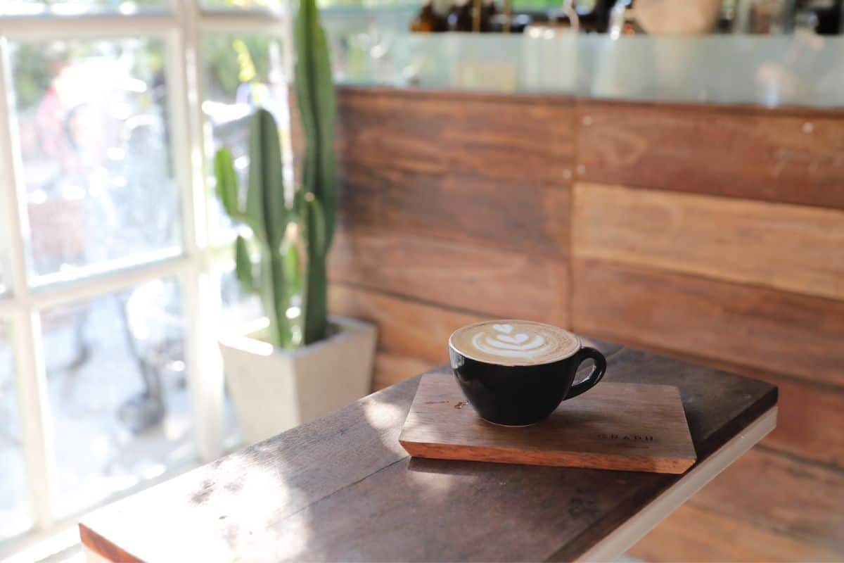 Cappuccino coffee on a wooden table